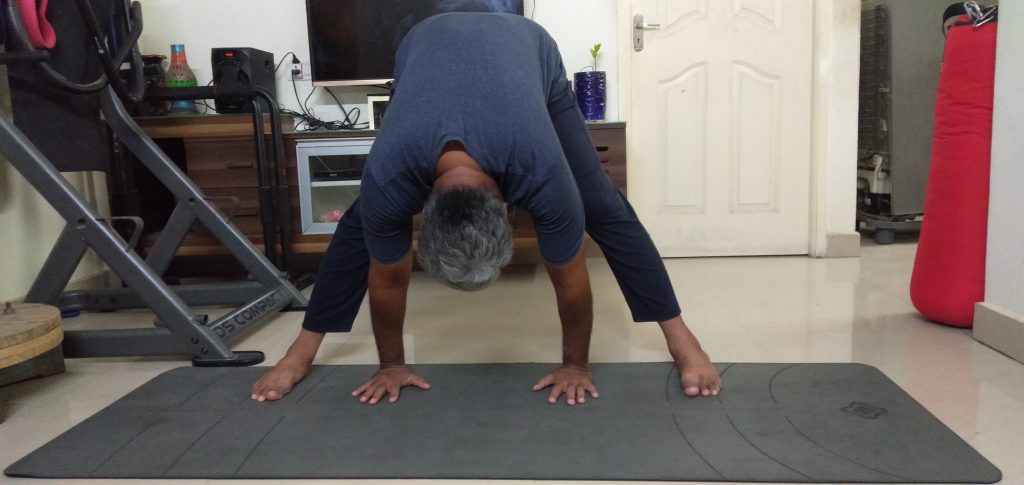Wide-Legged Forward Bend Pose for Beginners Variation 1