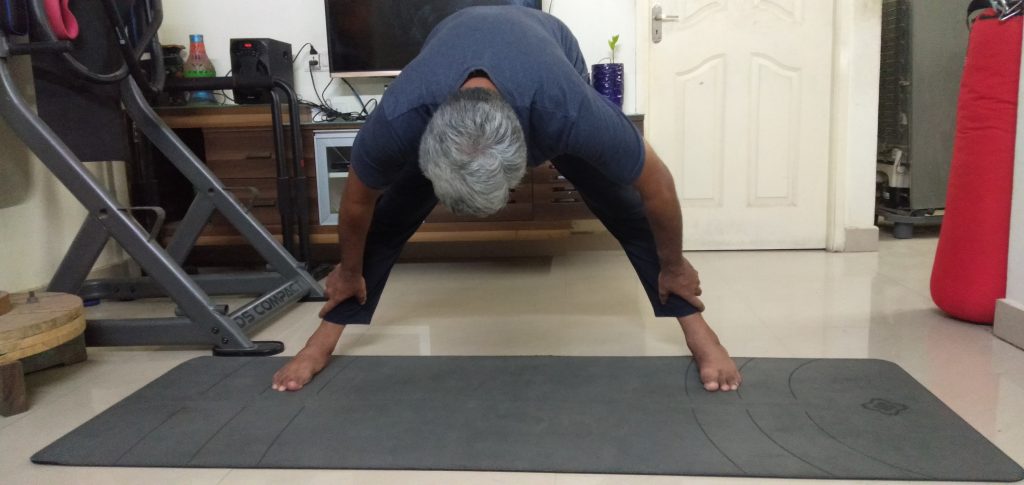 Wide-Legged Forward Bend Pose for Beginners - Variation 2